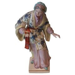 Antique Chinoiserie, Chinese Porcelain Figurine of a "Lady with Parrot", 19th Century