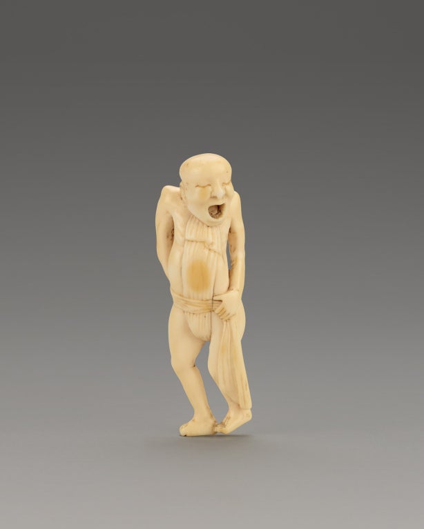 A humorous depiction of a naked man pulling up his fundoshi after the bath. His mouth is open and eyes squinting in discomfort as he pulls to tighten up on his crotch.

Please note: This item requires a CITES permit to ship outside the United