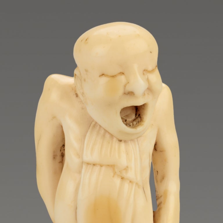 Japanese A Humorous Ivory Netsuke Of A Man Tying His Loin Cloth