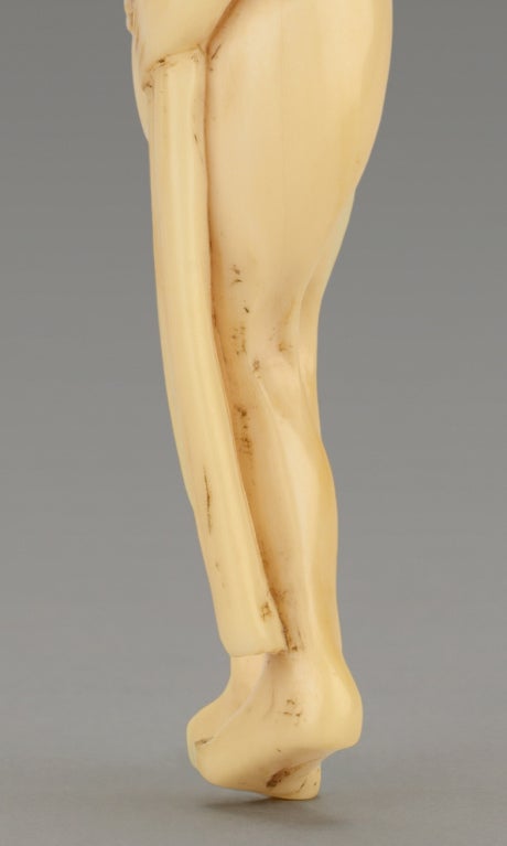 A Humorous Ivory Netsuke Of A Man Tying His Loin Cloth 4