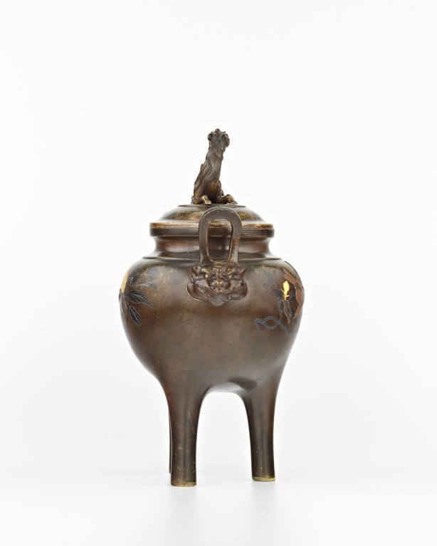 19th Century A bronze tripod koro
