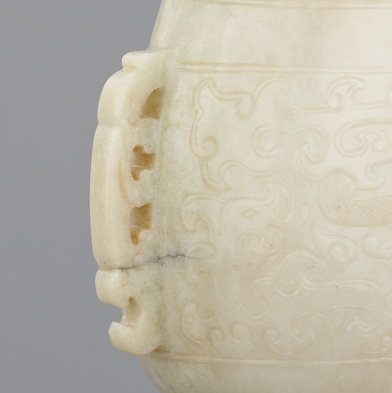 An archaistic jade vase and cover 2