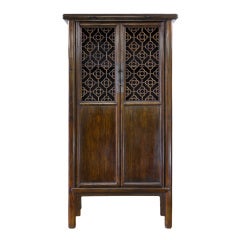 A cabinet with openwork