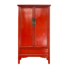 A red lacquer tapered cabinet