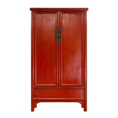 A red lacquer tapered cabinet