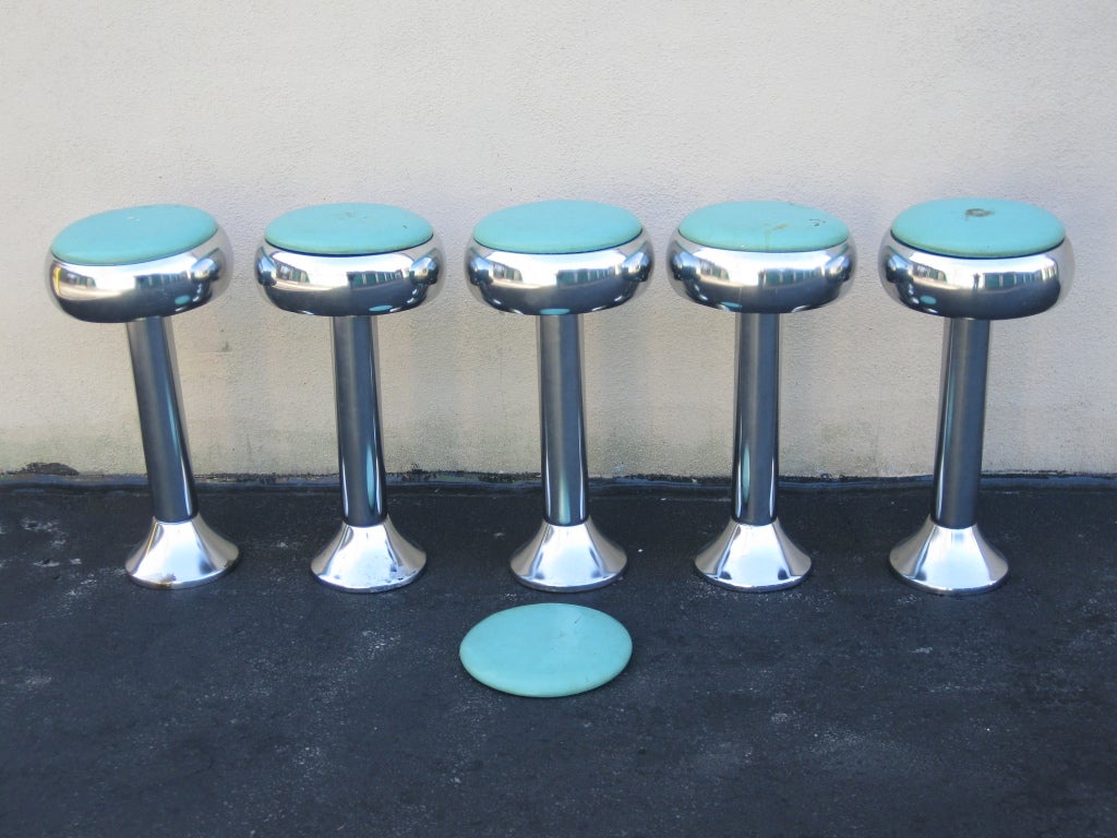 Price is for set of five fountain stools. Exceptionally good condition for age. A couple of the stools exhibit some minor blemishes on the chrome (shown in photos). Aqua/ robins egg blue colored vinyl seat covers have some stains and can easily be