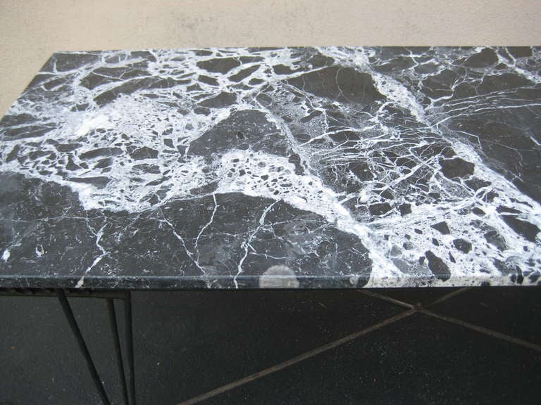 USA / ITALY
Circa 1950s Mid Century Large Marble and Wrought Iron large table or dining table by Maurizio Tempestino for Salterini. Gorgeous Italian Black and White Marble on Black Wrought Iron Base. For indoor interior or outdoor garden or patio.