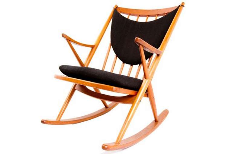 Designed by Frank Reenskaug for Bramin. Rocking Chair / Rocker in Solid teak. Original cushions are upholstered  in black wool.