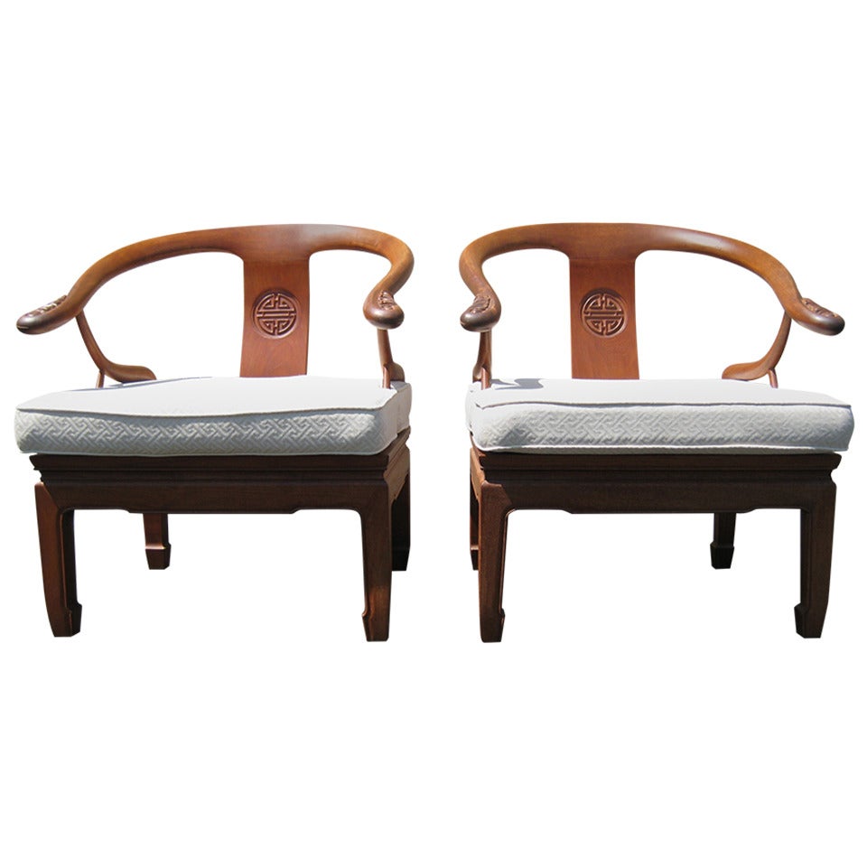 Mid-Century Asian 1950s-1960s. Carved teakwood. Upholstered cushion is in excellent condition with zipper for removable cover. Large, roomy and comfortable for sitting. Please visit measurements since we believe the chairs are larger in person than