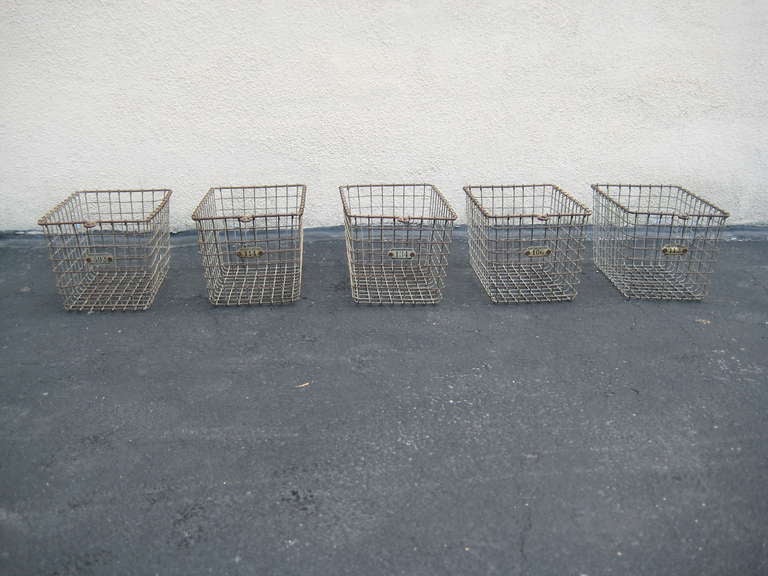 Vintage Set of Five Numbered Metal Locker baskets from Shiner Texas. 