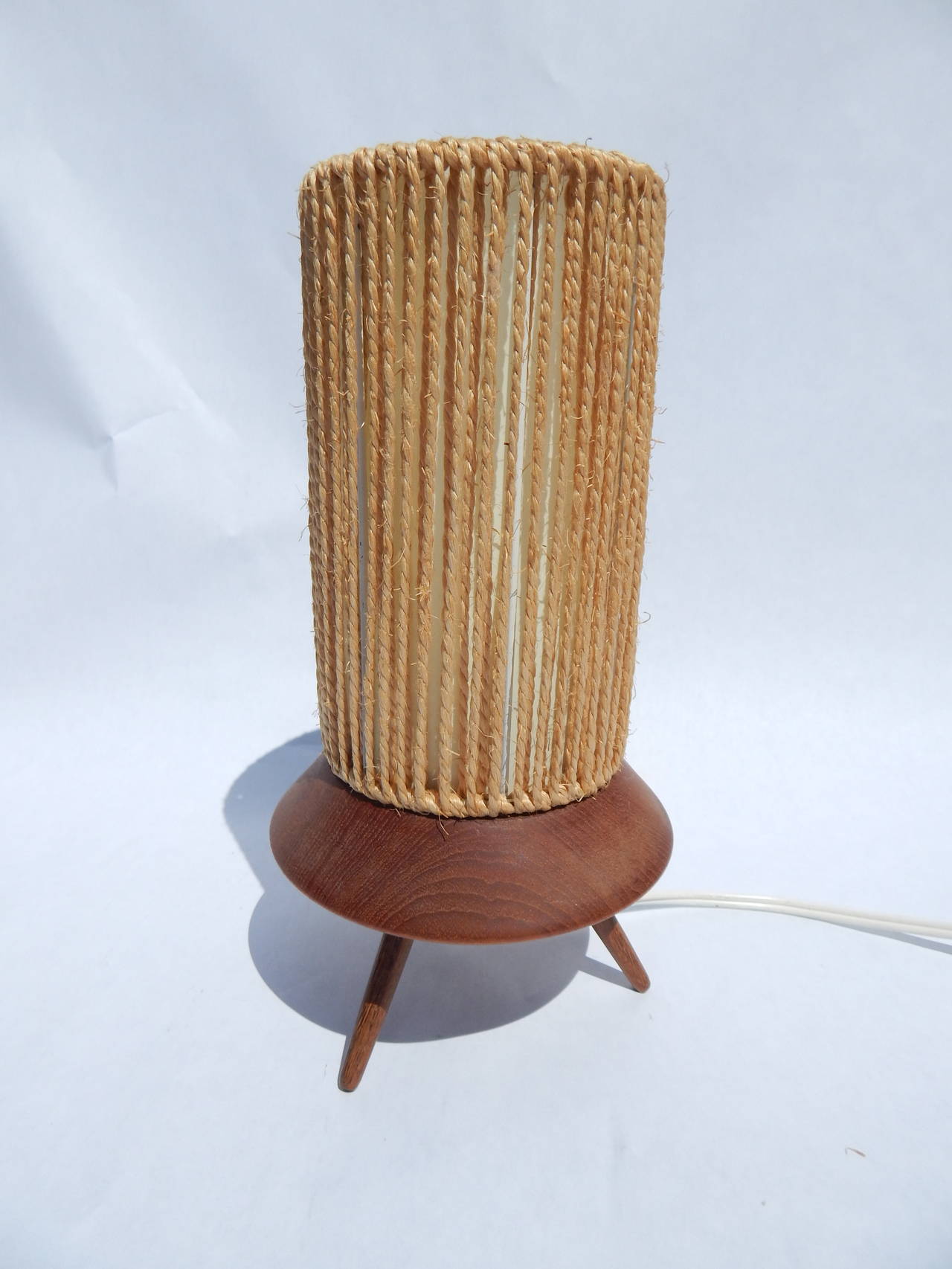 1960s Mid century table lamp. Teak base with rope shade.