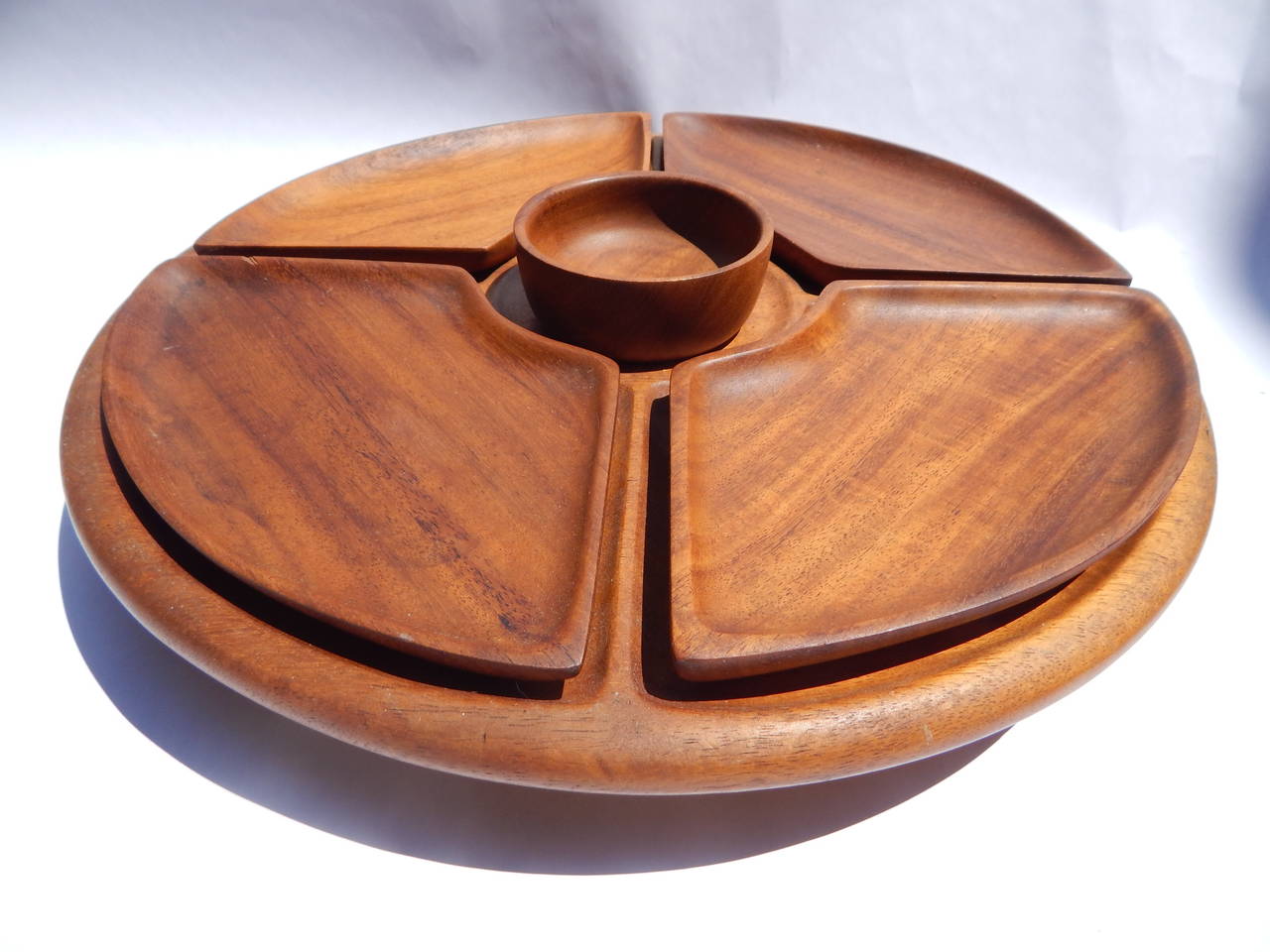 Mid Century 1960s 6 Piece Teak Lazy Susan. 
4 inch height at tallest with pieces included. 2 1/2 inch height without pieces.