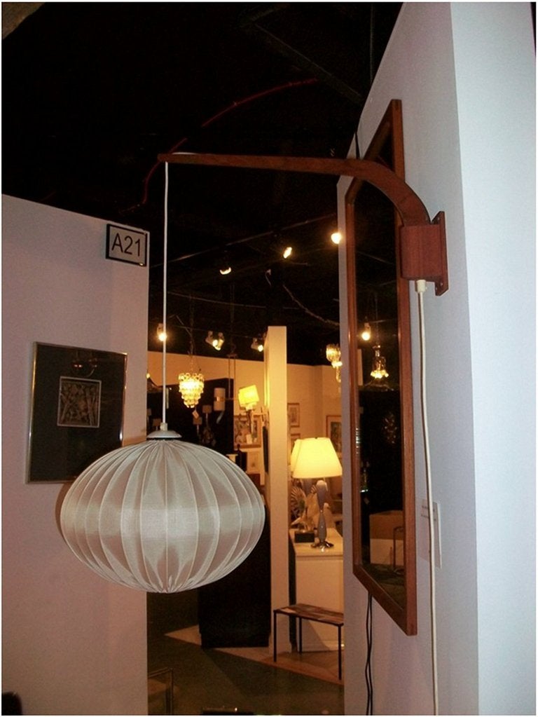 Mid Century hanging wall lamp with adjustable swinging arm. Shade is 17
