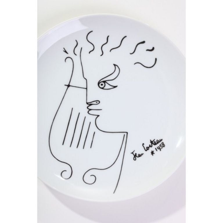 Set of 4 plates. Jean Cocteau for Limoge, 1958. Signed and dated.<br />
Price is for set of 4.