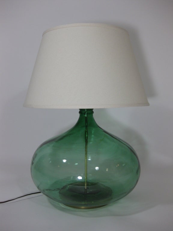 Hand blown green glass. Brass hardware and finial. New shade.
