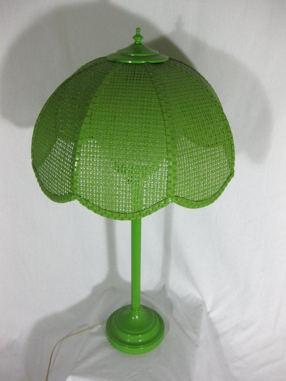 Lime Green enameled metal base, cap and finial. Green woven, wicker umbrella style shade. Large white globe that shows thru wicker shade when lit (see photo). Shade is 18