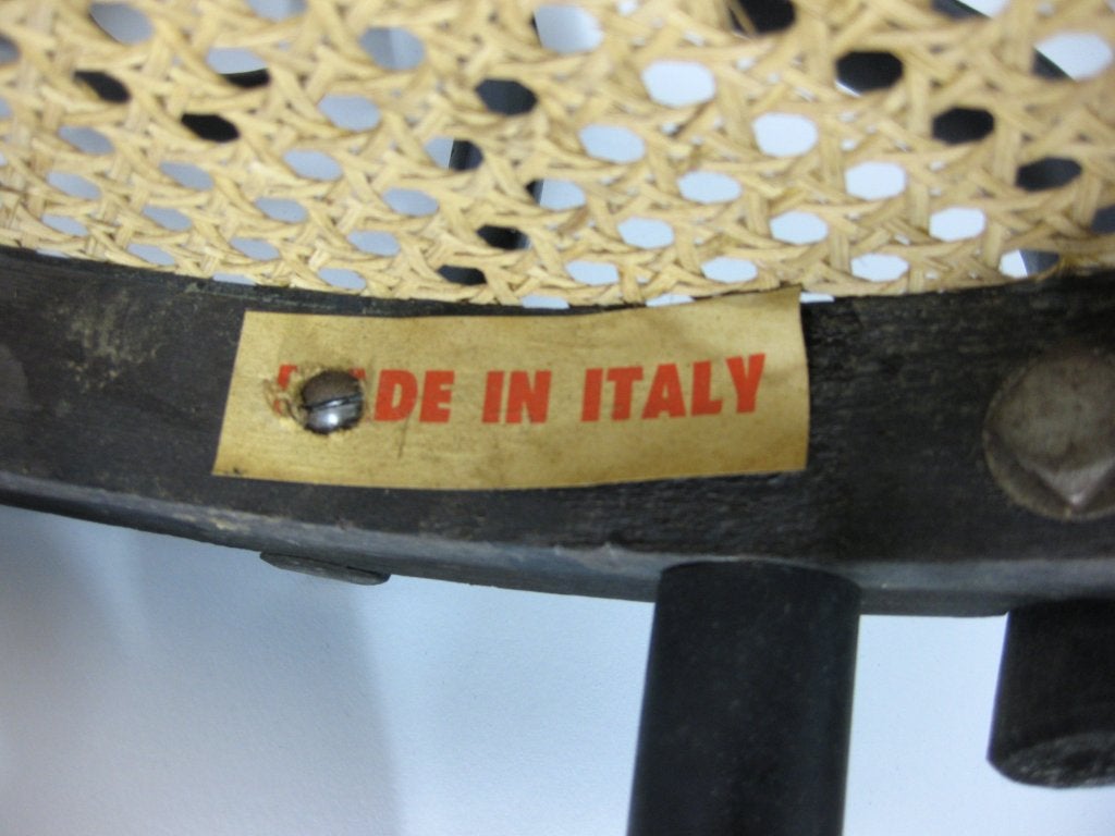 Marked made in Italy. Original black bentwood cafe or counter stool. Caning in excellent condition. Nice Patina. Wear consistent with age. 