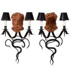 Exceptional Pair of Wrougt-Iron and Terracotta Sconces