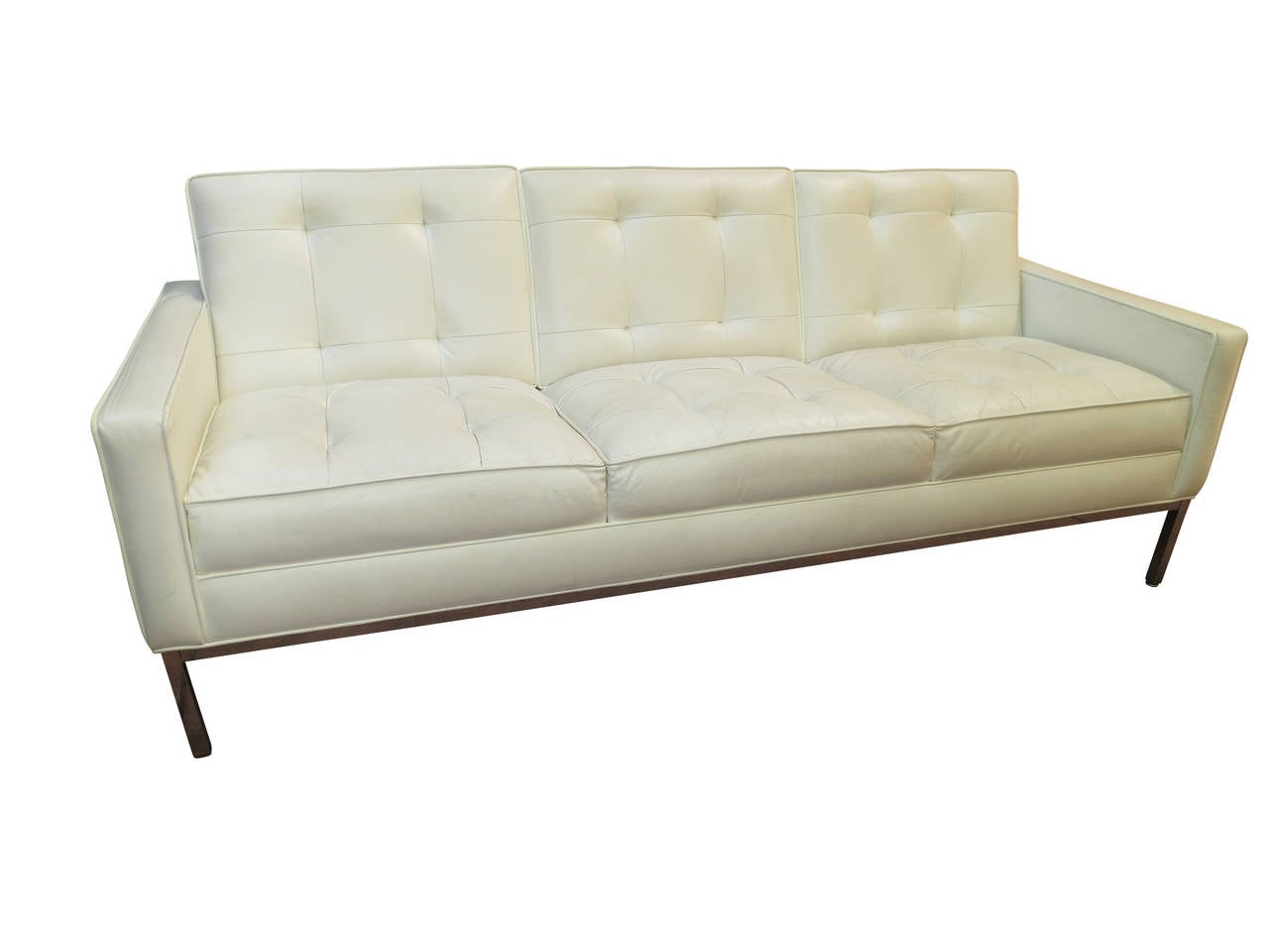 A classic tuxedo style sofa covered in white leather. The legs and surrounding frame are chromed metal. This is one of a pair of these Probber sofas. They are being offered separately.