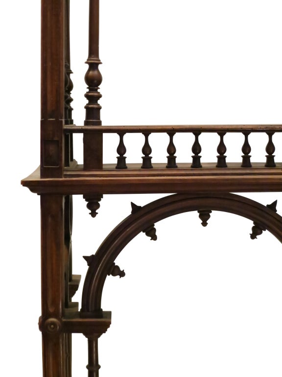 This is a European reliquary with nicely described balustrades, rose windows and arches. The architectural details are in good condition. The back has two more recent recessed brackets to allow for hanging.