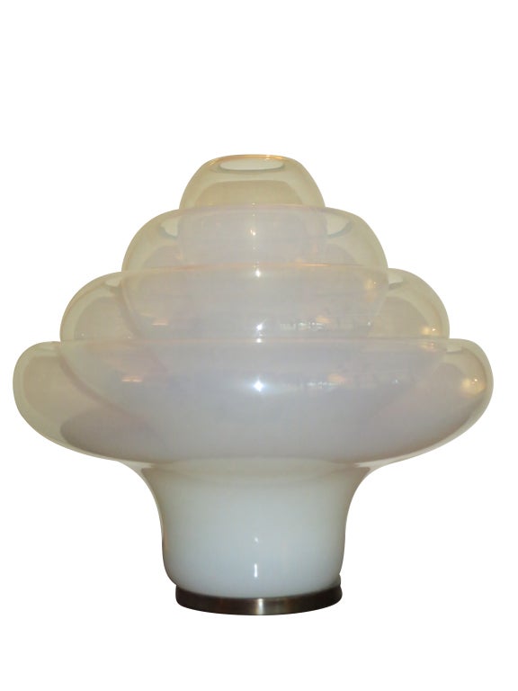 Carlo Nason designed Lotus Lamp made by Mazzega glassworks. The opalescent glass lamp consists of 4 separate, graduated bowls. Each is secured in the chromed metal base. The second bowl from the bottom has a very small rim chip which is evident in