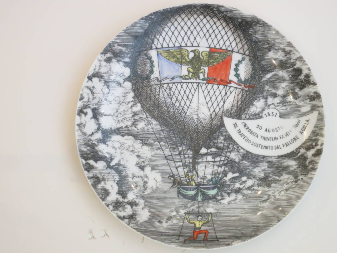 A set of 5 hot air balloon plates designed by Piero Fornasetti in 1955. Each plate is marked on back as indicated in the included detail photo.