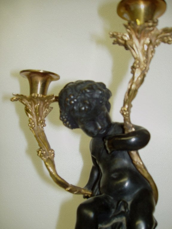 Italian Pair of Putti Candelabra For Sale