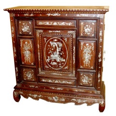 Cabinet with inlay