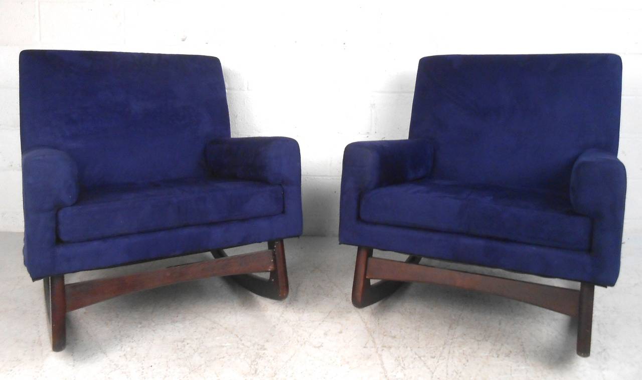 This unique pair of suede rocking chairs feature unique Danish design and make a perfect matching pair of modern chairs for any seating situation. Contact dealer for details on purchasing separately, please confirm item location (NY or NJ).