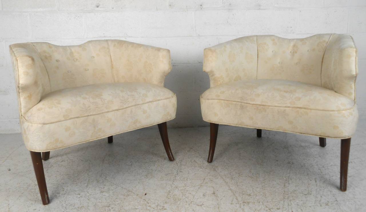 This vintage pair of unique armchairs feature unique sculpted design set on sturdy hardwood frame. Wonderful set of chairs for home or business seating, please confirm item location (NY or NJ).