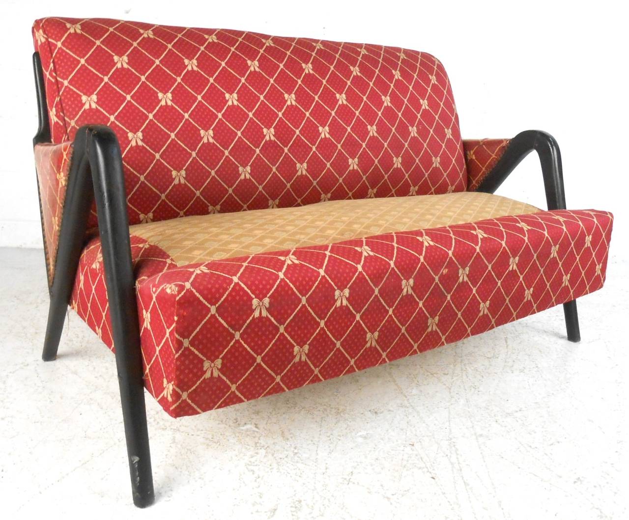 This Italian style sofa features unique sculpted frame covered in rich vintage fabric. Missing original seat cushion must be replaced, unique seating for home or business. Please confirm item location (NY or NJ).
