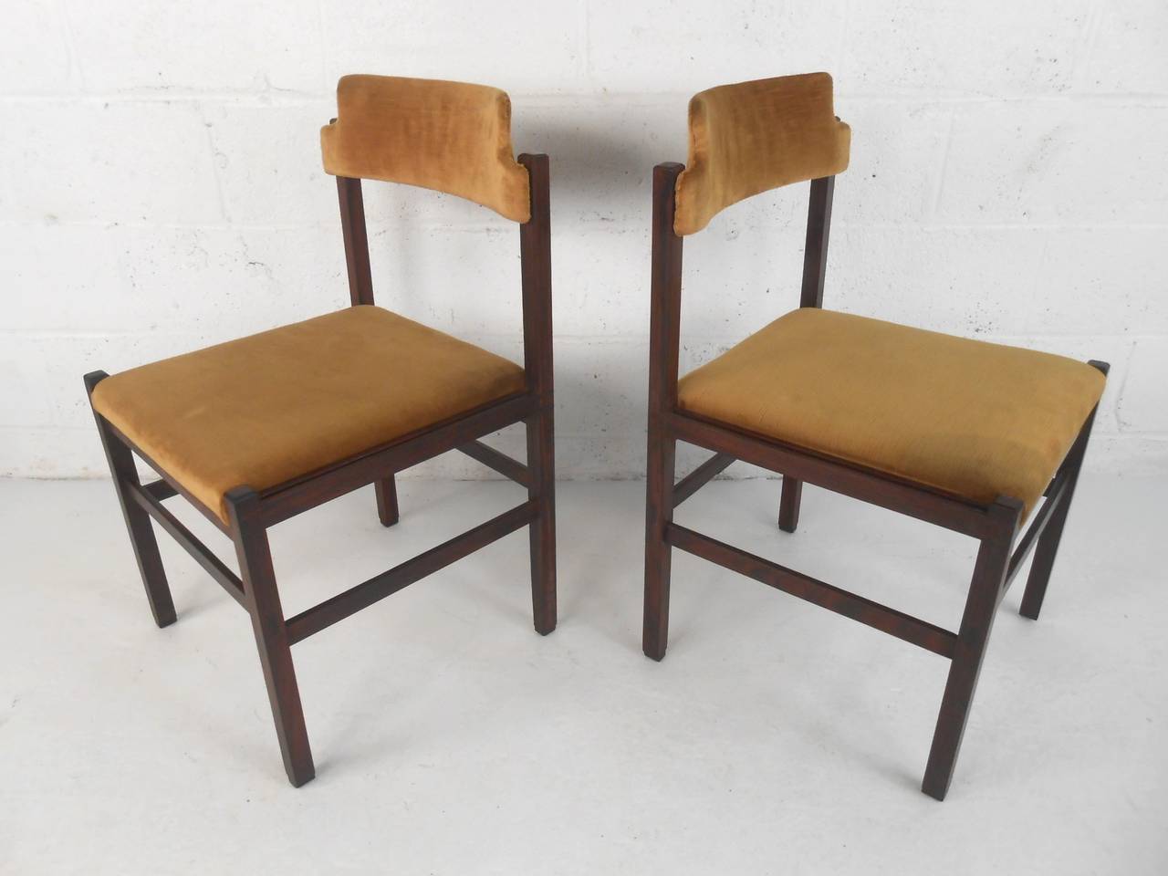 Vintage set of dining chairs from Italy with rich rosewood frames and golden velvet fabric covering. Solid square style frame. Easy to recover.

(Please confirm item location - NY or NJ - with dealer).