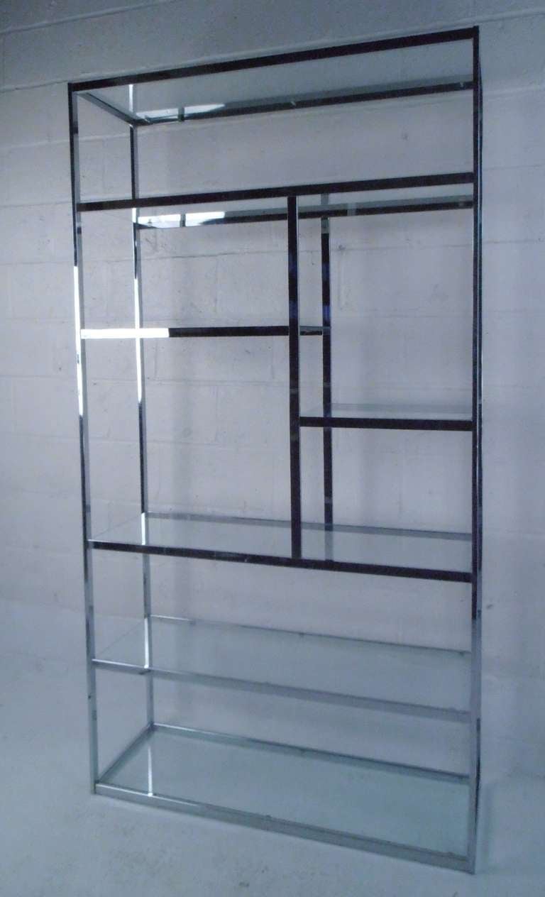 Mid-Century Modern seven-shelf chrome etagere features Milo Baughman style design. Elegant modern display shelf perfect for home or business use. Please confirm item location (NY or NJ) with dealer.