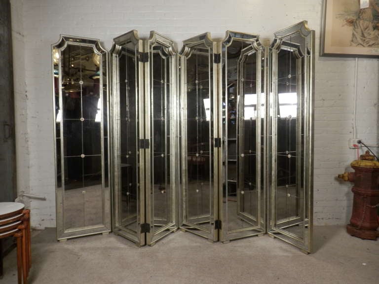 Tall folding screen in a wonderful silver and gold accenting frame. Can be combined to make a large six panel screen.'
***LISTING IS FOR ONE 3 PANEL SCREEN***

(Please confirm item location - NY or NJ - with dealer)