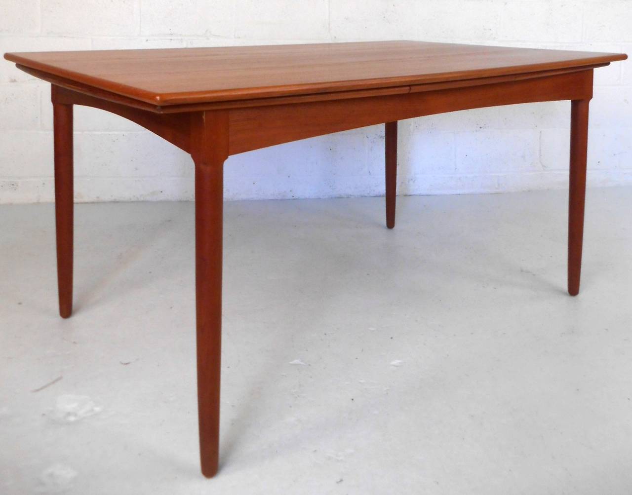 Exquisite Mid-Century Modern Danish Teak Draw Leaf Dining Table