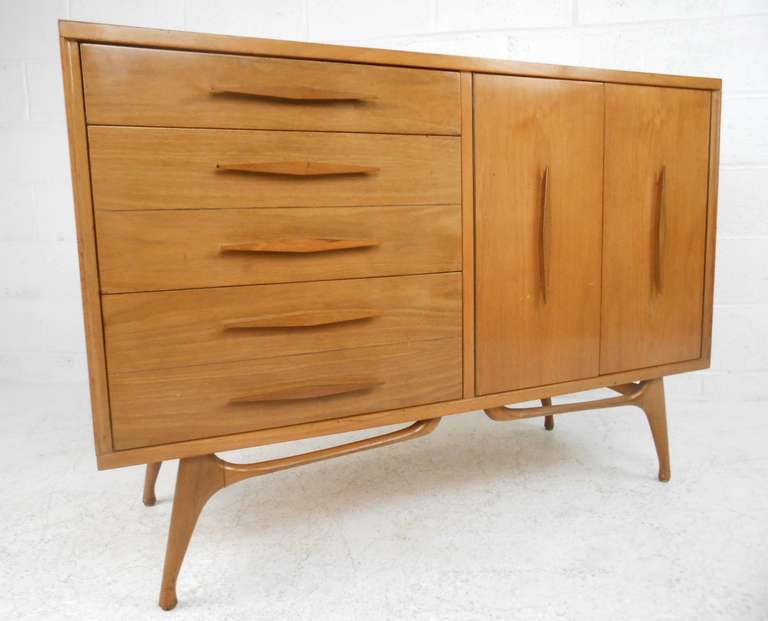 Stylish mid century smaller-scale dresser/credenza. Please confirm item location (NY or NJ) with dealer.