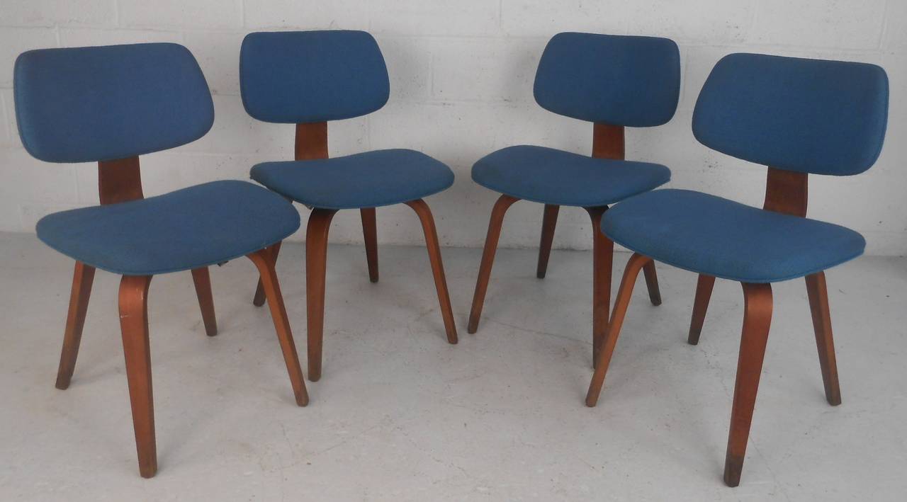 Set of four Thonet molded plywood side chairs with upholstered seats/backs. Please confirm item location (NY or NJ) with dealer.