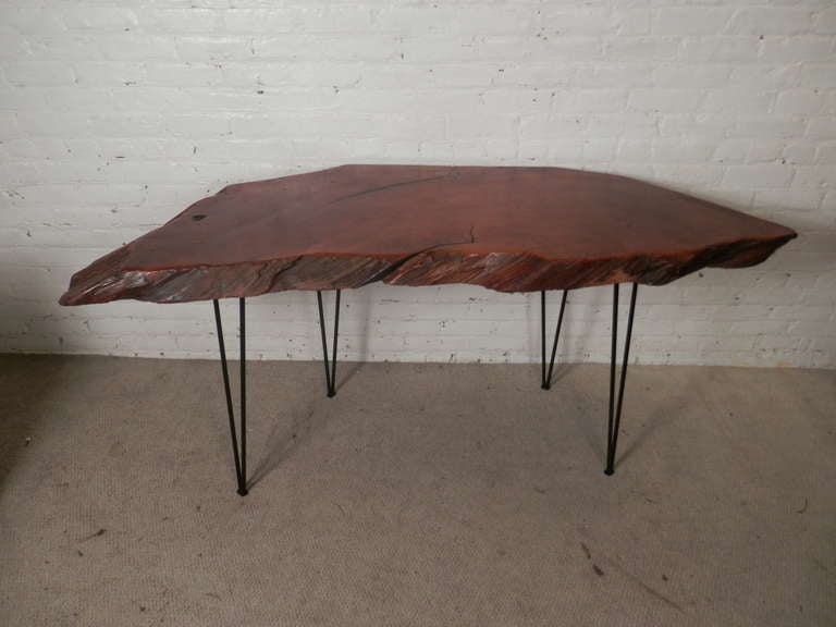 A superb vintage desk made of solid live edge slab on four hair pin legs. Delicate and rugged with plenty of desk space. The back is flat to rest properly against any wall.

(Please confirm item location - NY or NJ - with dealer).