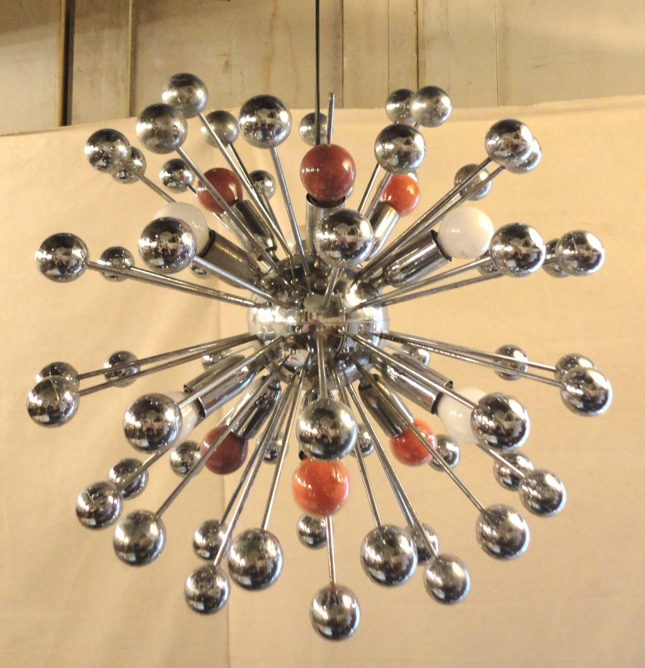 Vintage modern atomic style pendant light. Made of chrome rods with polished globes, giving an 