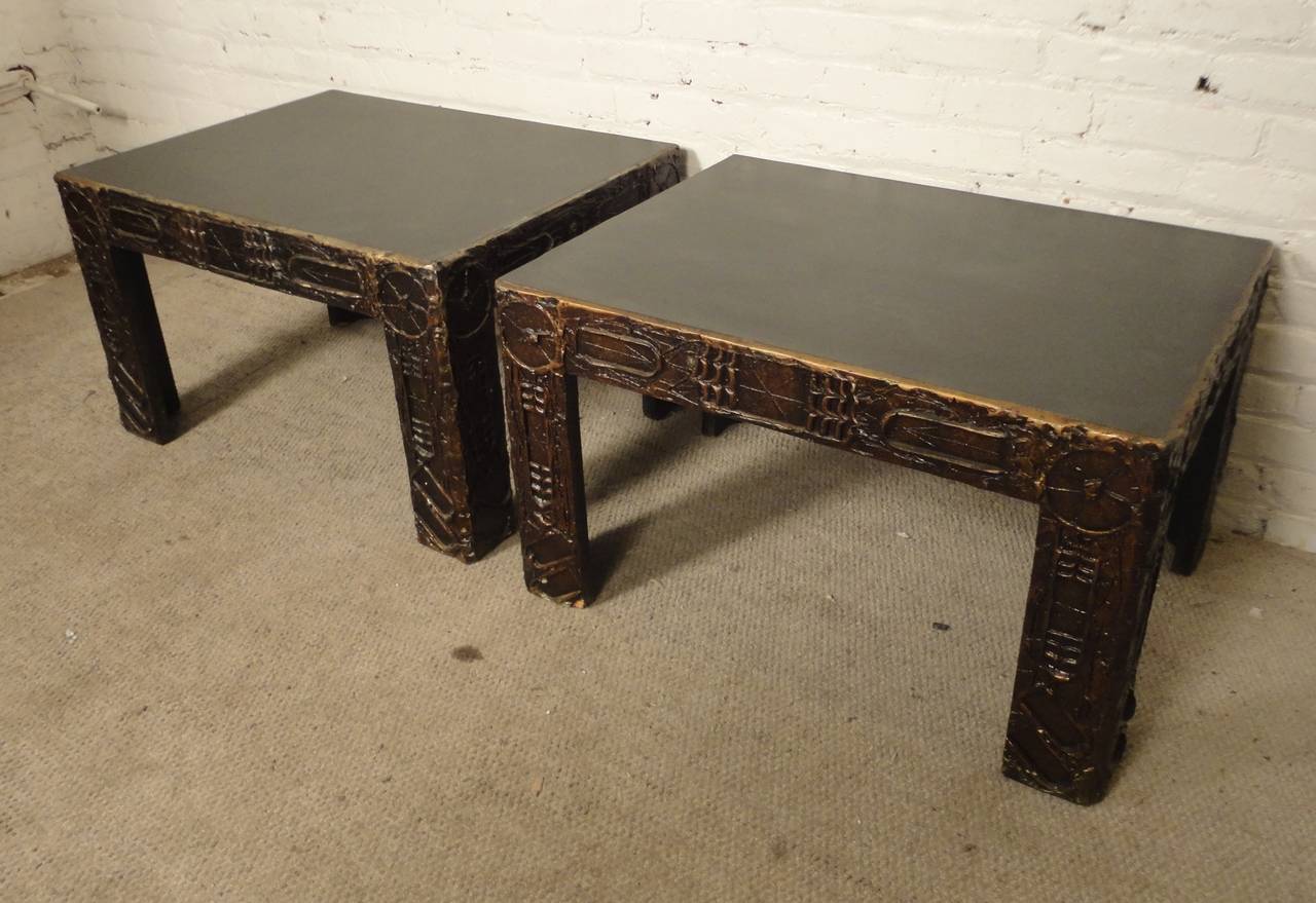 Pair of vintage modern resin side tables for Craft Associates in the brutalist manner of Paul Evans. Great hand detailing along all sides. Black tops and gold/brown sides.

(Please confirm item location - NY or NJ - with dealer)