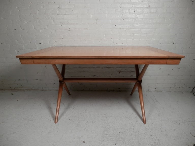 Unusual maple table with sliding ends to accommodate leaves (not included). Please confirm item location - NY or NJ - with dealer)