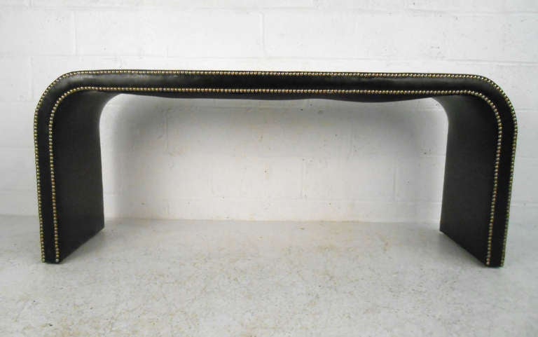 This vintage faux skin studded console table makes a wonderful addition to any home or business decor. Please confirm item location (NY or NJ).