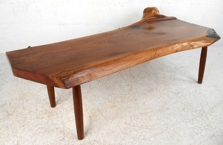 This wonderful natural cut wood slab coffee table top features unique natural details that add to the beauty of the table. Please confirm item location (NY or NJ).