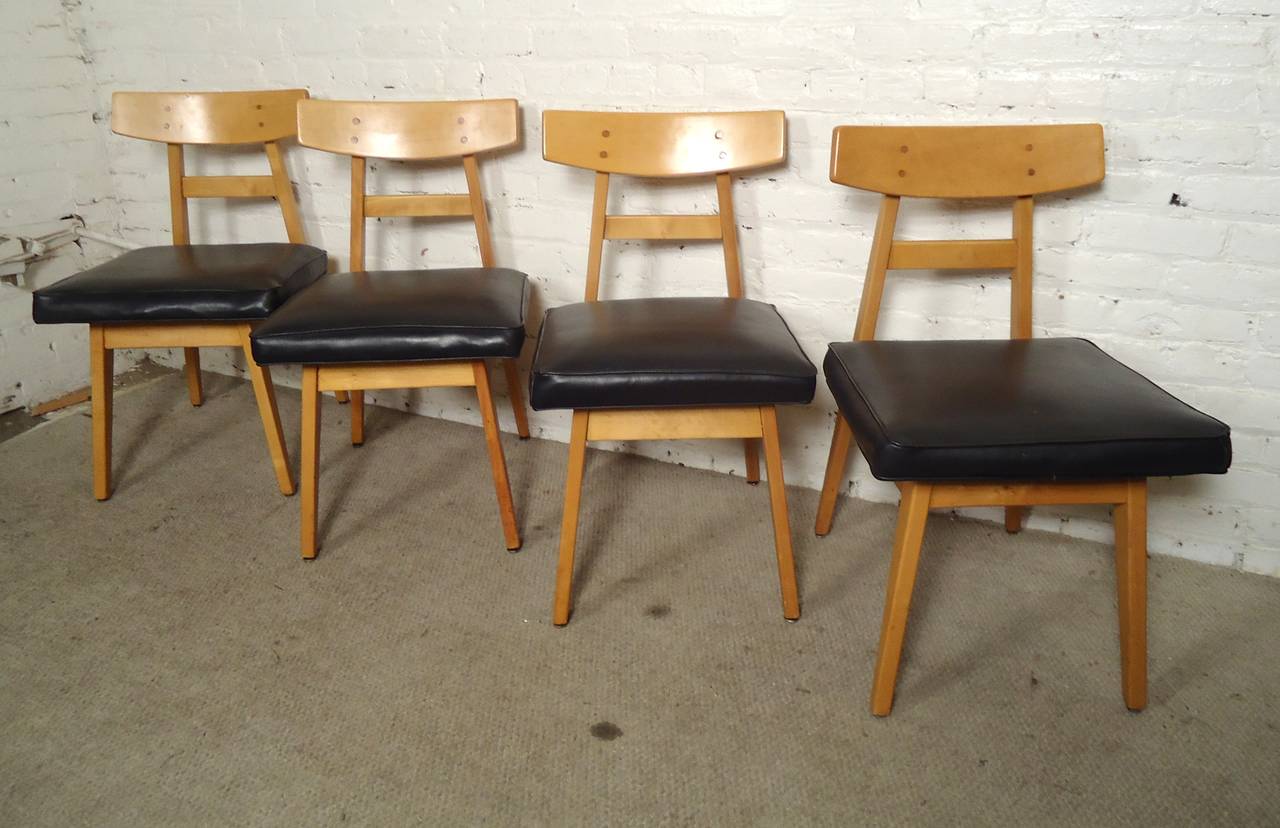 Four Mid-Century Modern maple chairs designed by Jens Risom. Thick cushioning, angled frames. Dining table pictured is not part of the listing, but is available.

(Please confirm item location - NY or NJ - with dealer).
