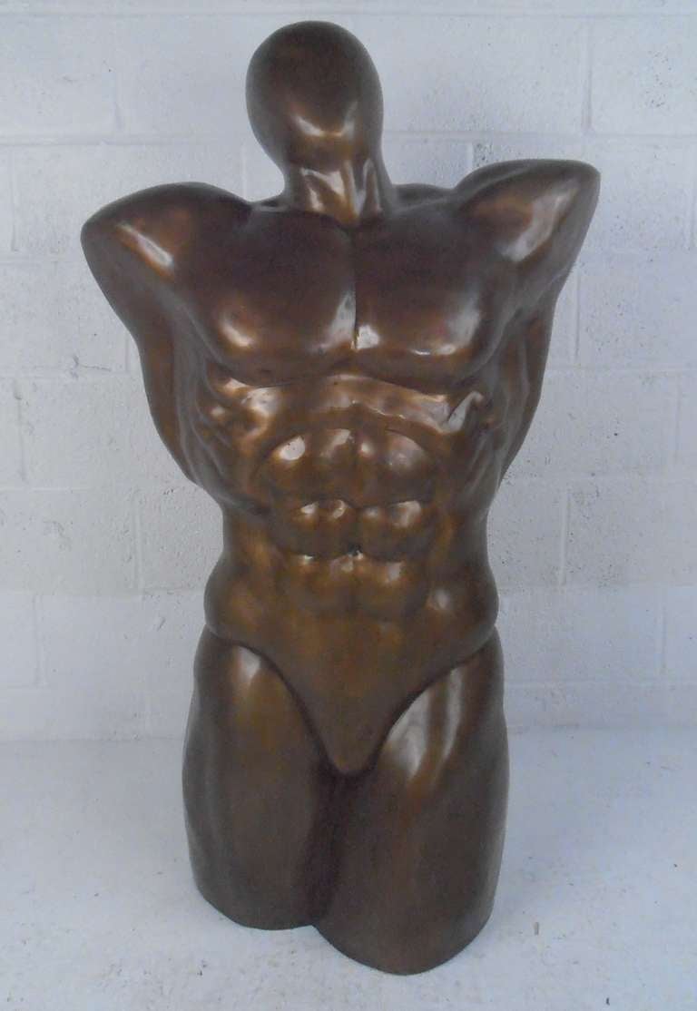 Impressive muscular male torso in bronze, makes a stylish sculptural addition to any interior. Please confirm item location (NY or NJ) with dealer.