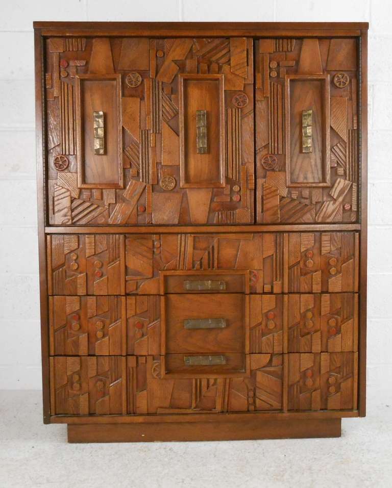 Great sculptural Brutalist-style highboy dresser with double doors on top concealing three drawers and three more on bottom. Please confirm item location (NY or NJ) with dealer.