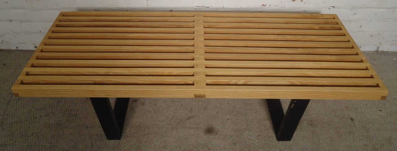 Vintage slat bench with maple top and painted black sled legs. Designed by George Nelson for Herman Miller.
Perfect for use as bench or coffee table.

(Please confirm item location NY or NJ with dealer).