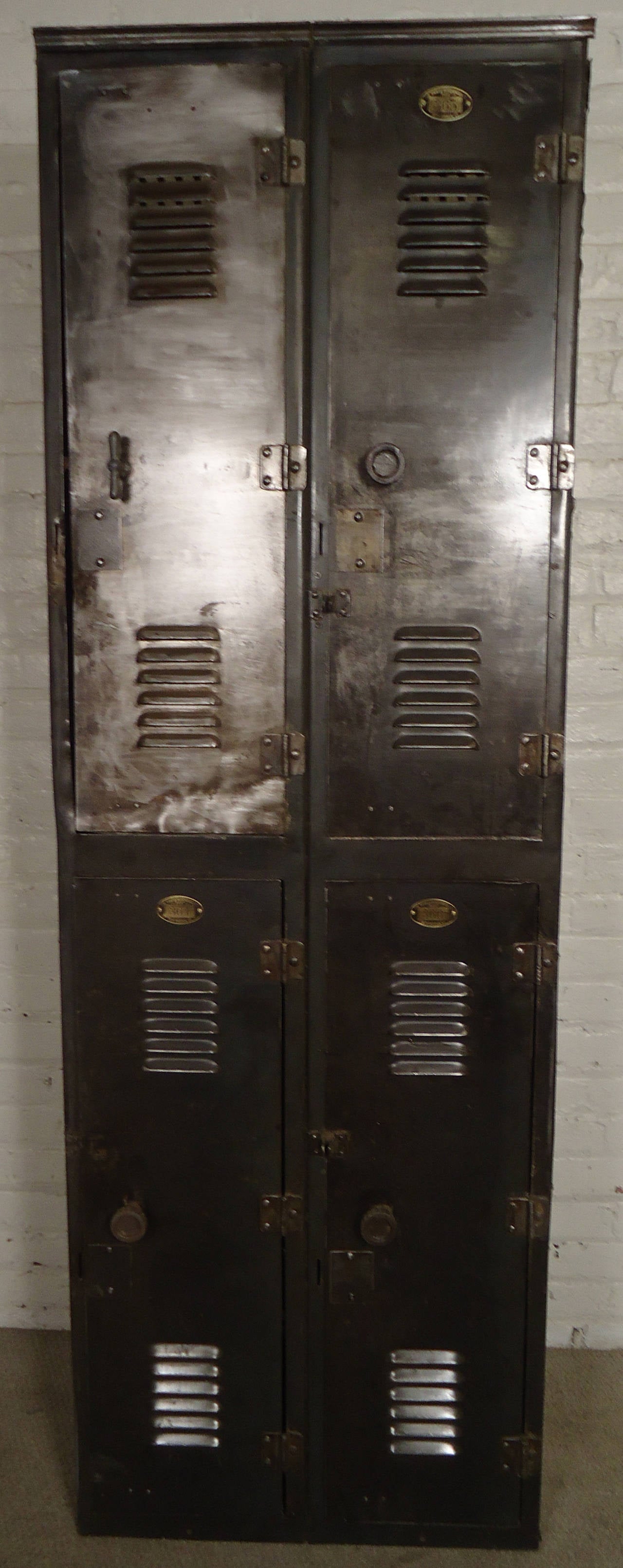 Vintage four door locker unit by H&H, The Hart & Hutchinson Company, manufactured in New Britain CT. Cabinet features functioning latches, original brass plates and coat hooks inside.

(Please confirm item location - NY or NJ - with dealer)