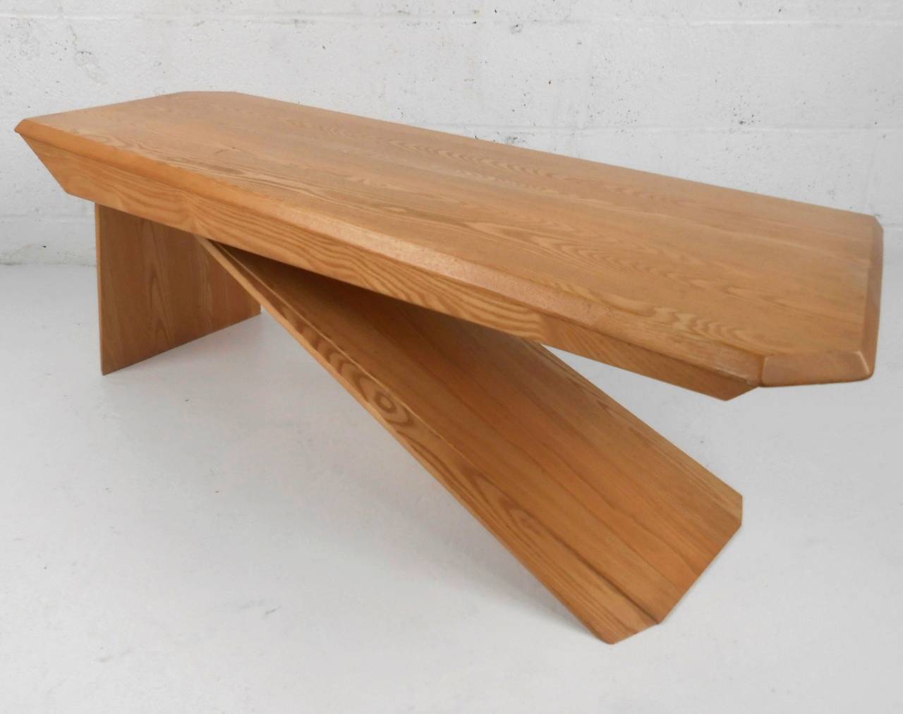 This beautiful cantilevered coffee table features unique angles and wonderful woodgrain. Modern architectural design at it's best and suitable for any interior setting. Please confirm item location (NY or NJ).