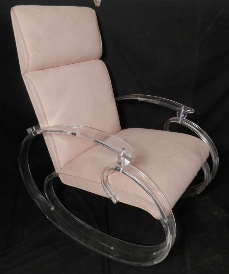 Mid-Century Modern rocking chair made of thick lucite with oval swirl shaped rockers. Tall back, very comfortable.

(Please confirm item location - NY or NJ - with dealer).